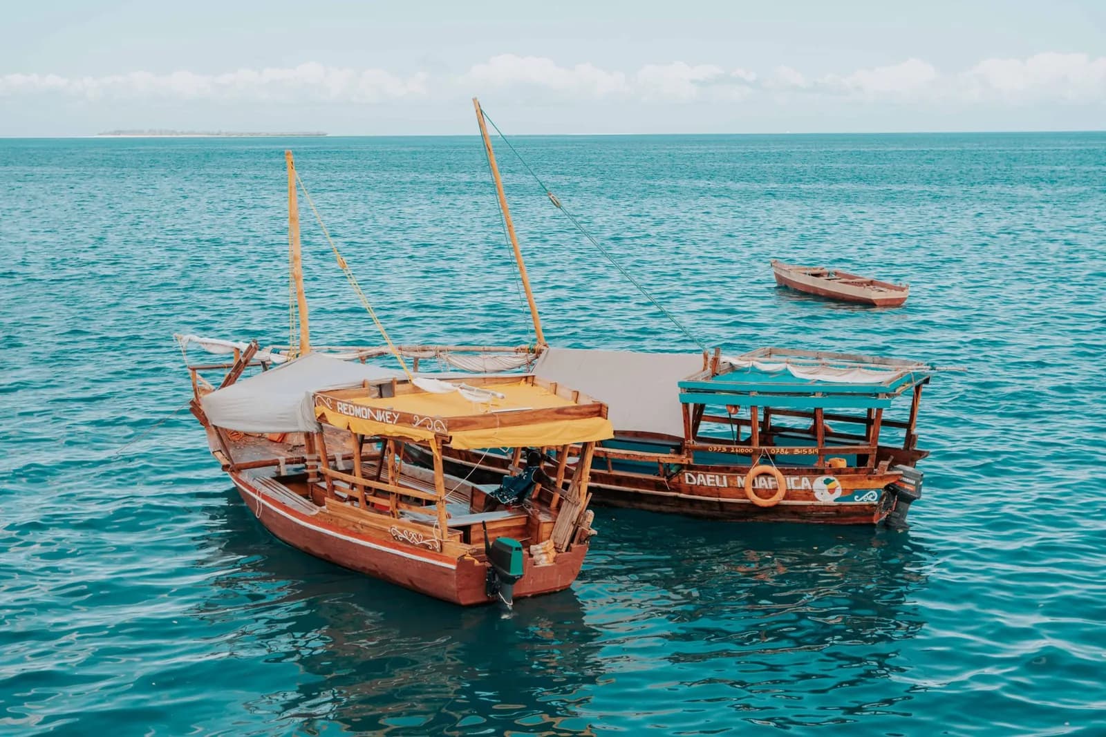 Traditional dhows on the water off the Zanzibar coast