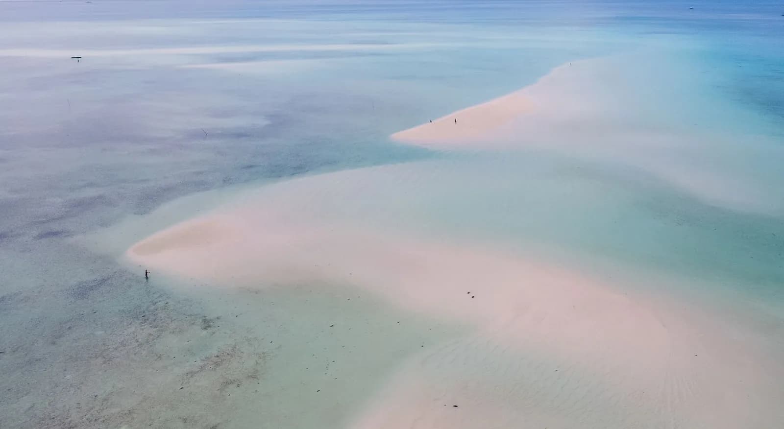 Sandbanks uncovered by the falling tide on the east coast lagoon of Zanzibar