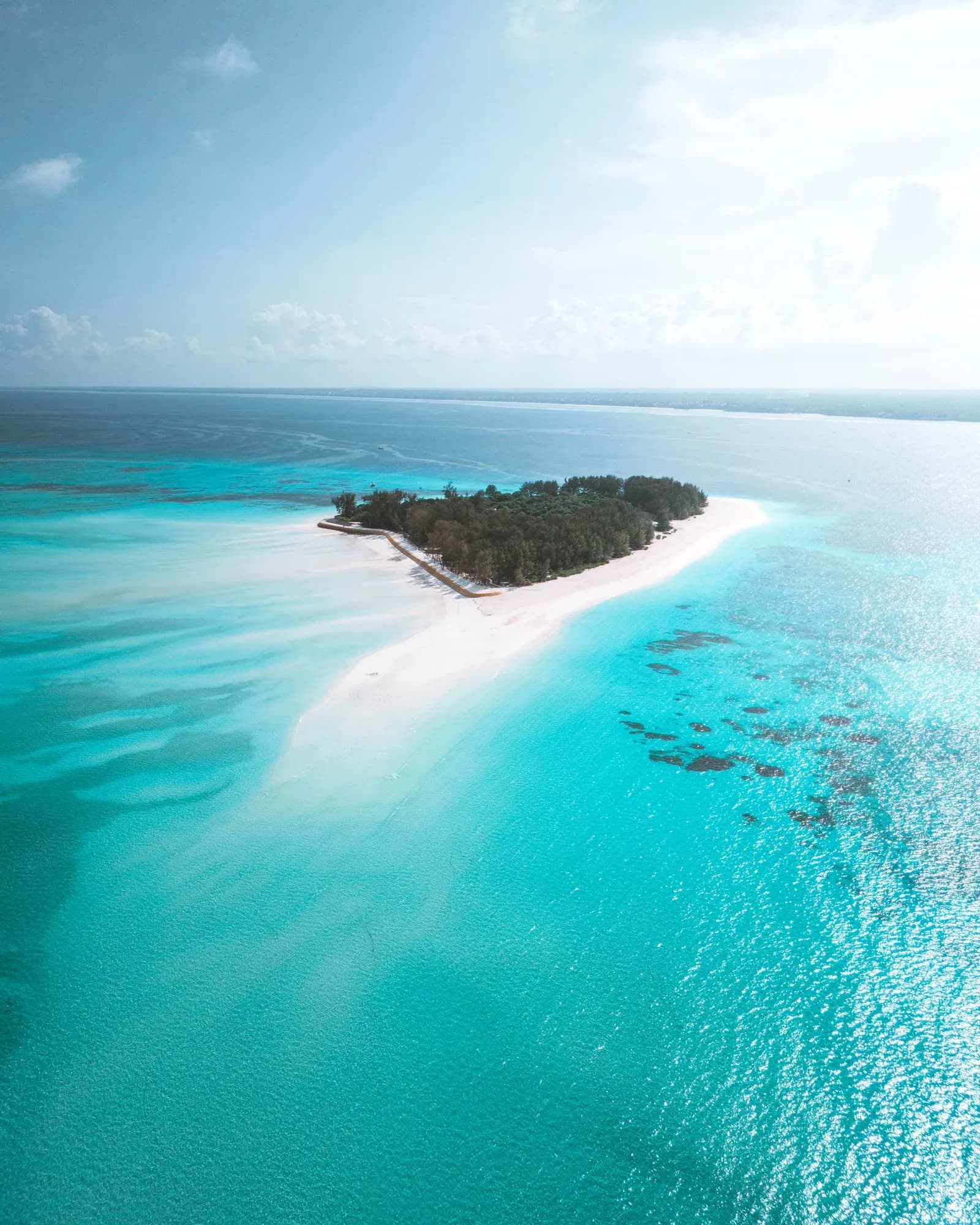 Mnemba atoll and its reef seen from the air, opposite the Matemwe coast