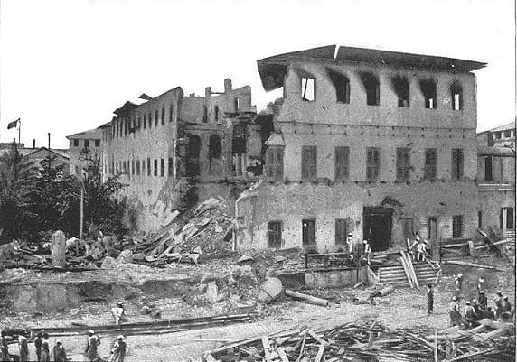 The sultan's palace in Stone Town in ruins after the British bombardment of 27 August 1896, with sailors among the rubble