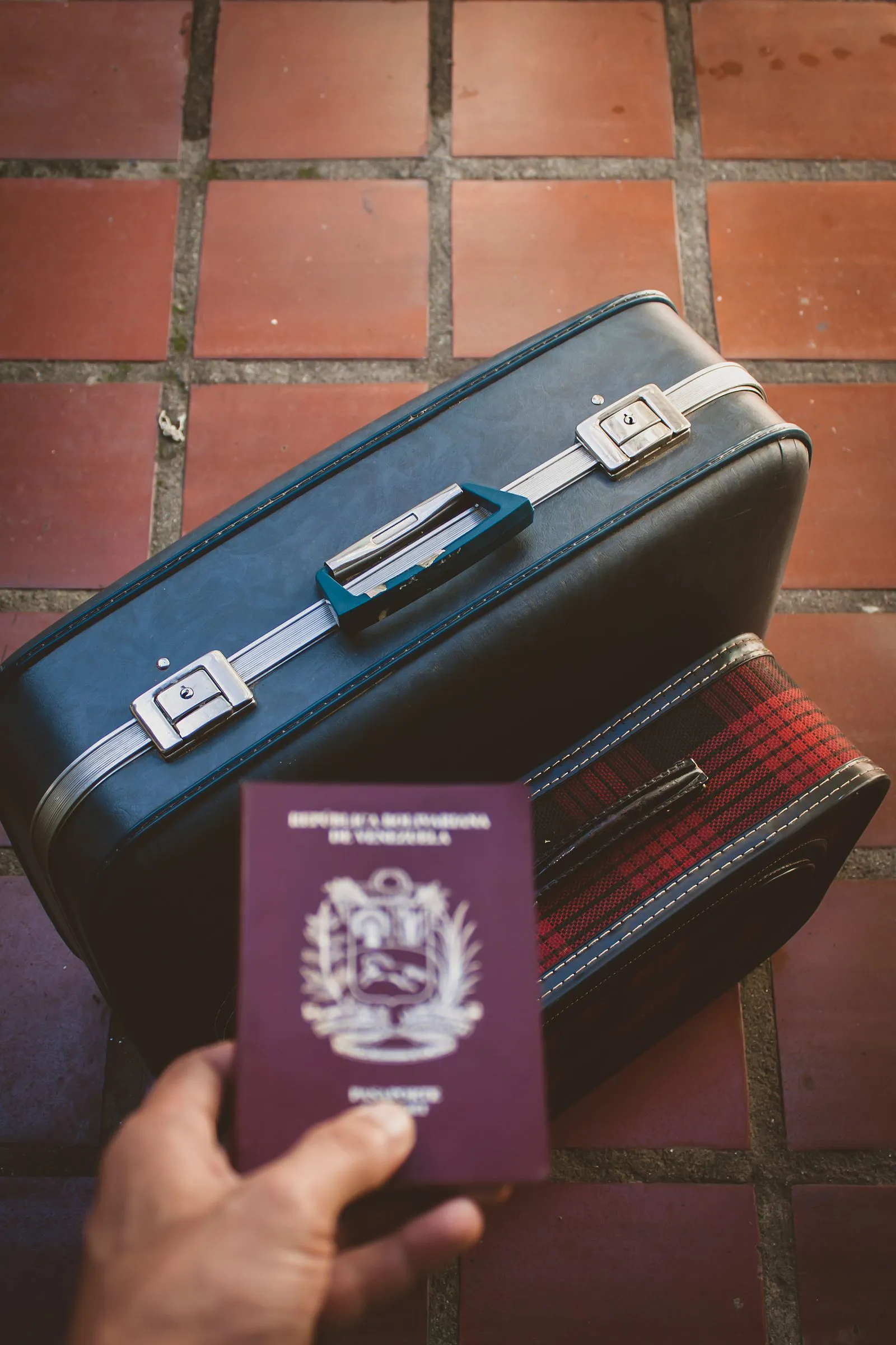 Travel documents and a passport laid out on a desk