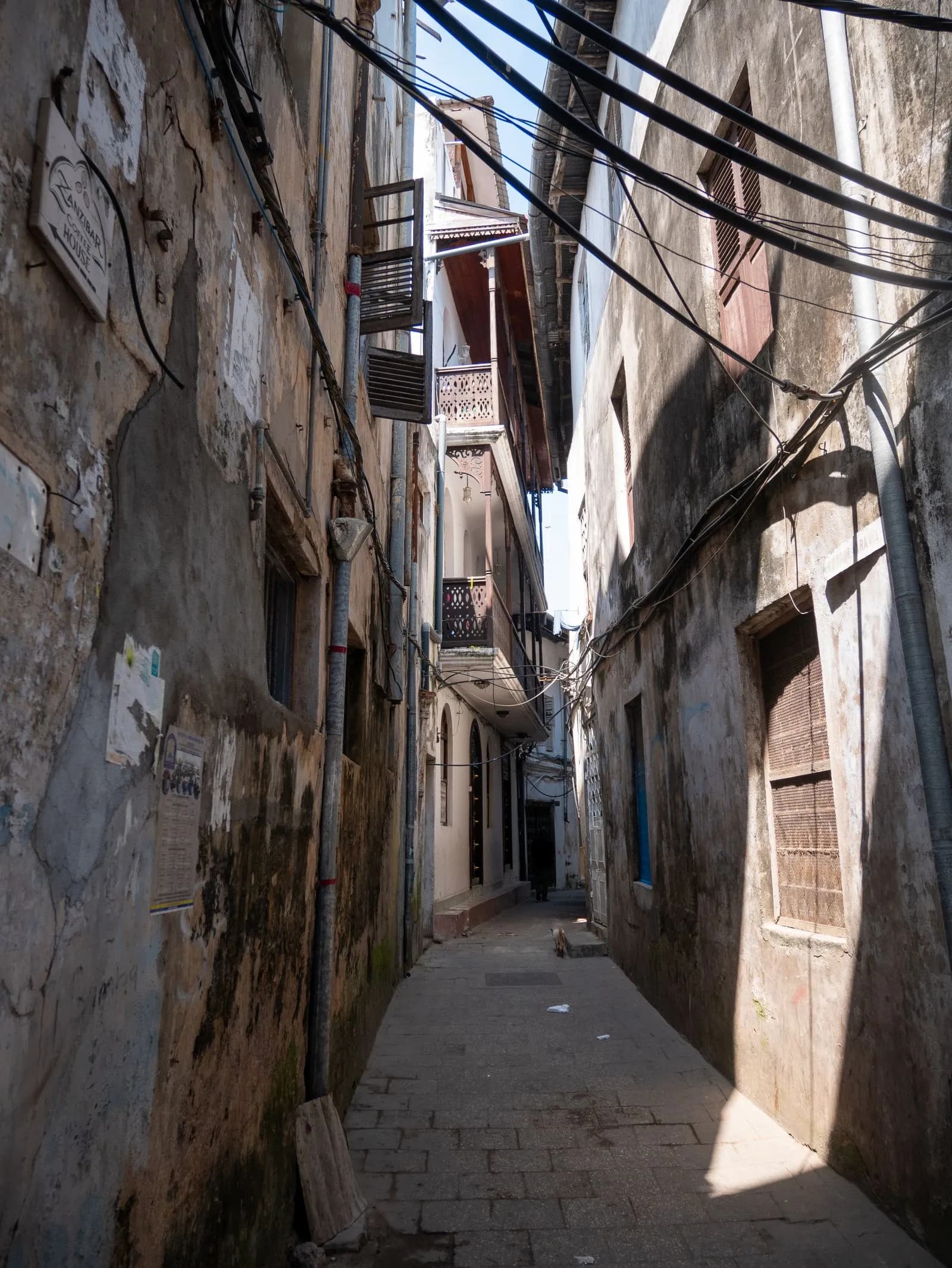 Historic lane between coral stone buildings in Stone Town, Zanzibar